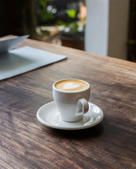 White Ceramic Cup on Saucer · Free Stock Photo