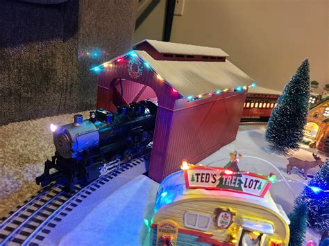 New lighted covered bridge for under the Christmas tree. : r/lioneltrains