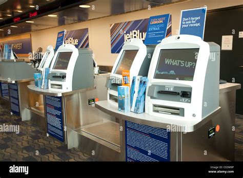 Jet Blue ticketing area kiosks are vacant during snow emergency at Bradley International Airport ...