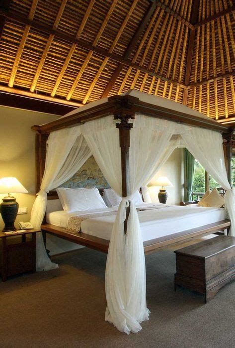 Each of the standalone villas feature traditional thatched roofs, dreamy four-poster beds and ...