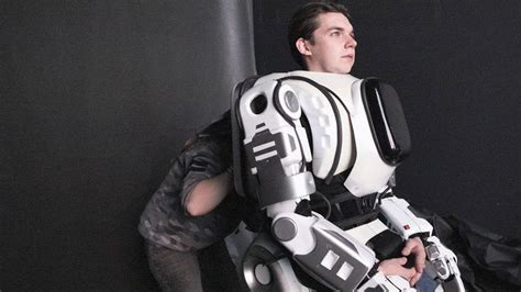 Robot turns out to be man in suit - BBC News