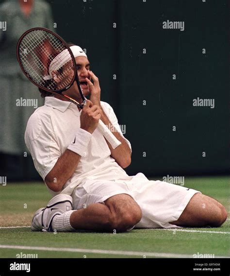 Switzerland's Roger Federer celebrates beating Pete Sampras Stock Photo ...