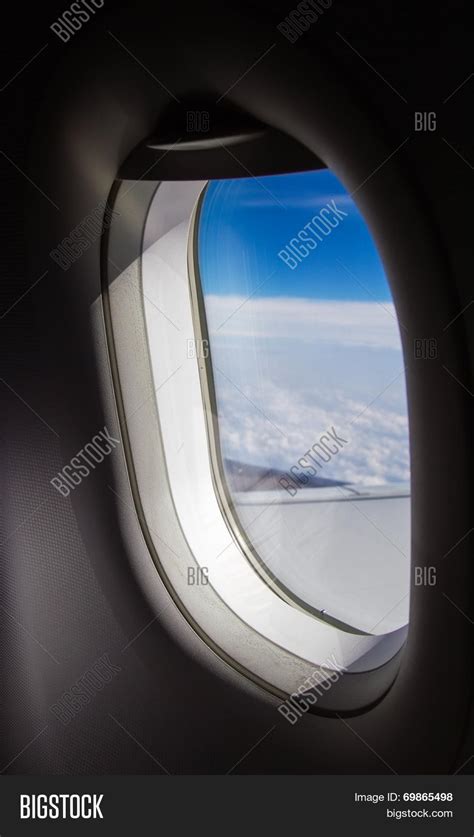 Plane Window Blue Sky Image & Photo (Free Trial) | Bigstock