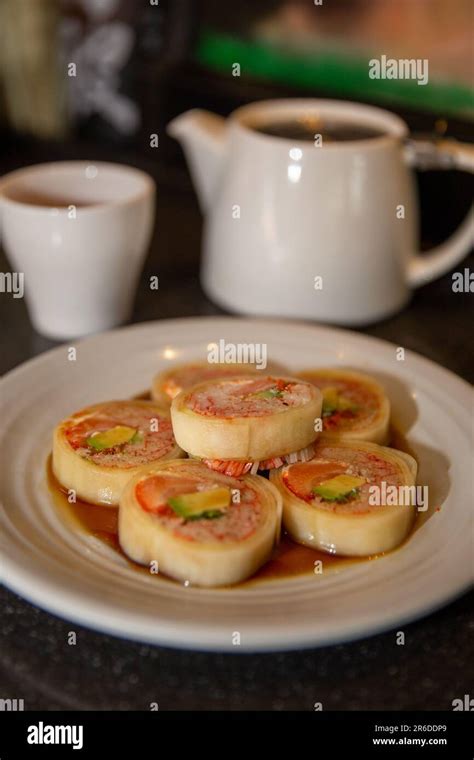 Naruto Maki Roll with Ponzu Sauce at a sushi bar Stock Photo - Alamy