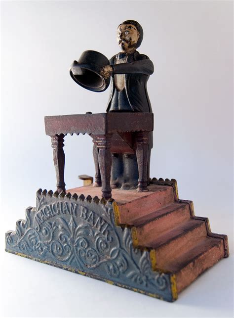 Magician Antique Mechanical Cast Iron Bank