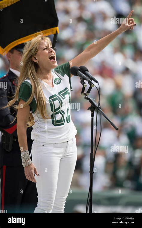 September 27, 2015, Lilian Garcia performs the National Anthem during the NFL game between the ...