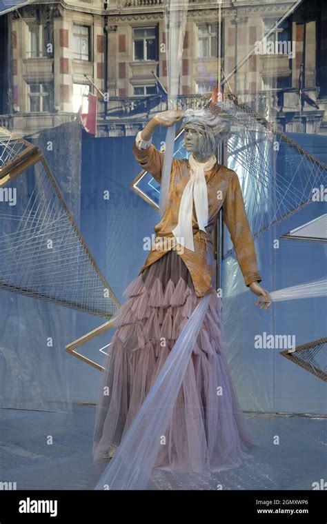 A window display showing a mannequin Stock Photo - Alamy