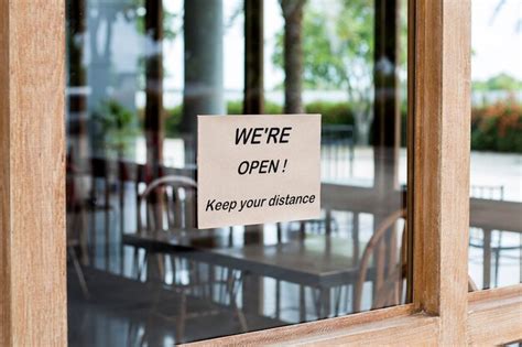 Premium Photo | The sign in front of the office is temporarily closed sign coronavirus in the store