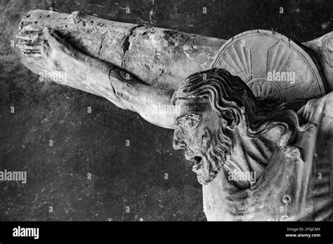 A grayscale shot of the statue of Jesus' crucifixion Stock Photo - Alamy