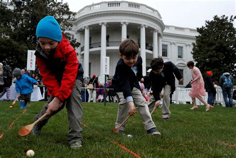 People participate in the annual White House Easter Egg Roll on the South Lawn of the White ...