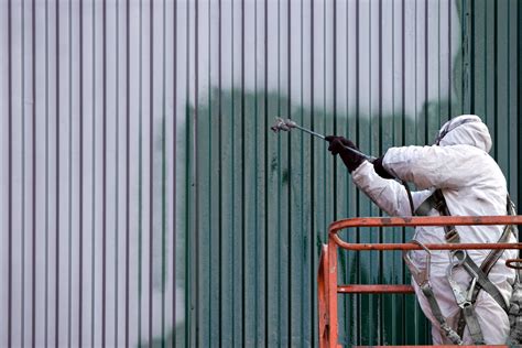 5 Tips for Painting a Commercial Metal Building - The Painting Pros