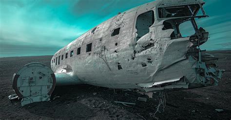 Wrecked White Airplane on Gray Sand · Free Stock Photo