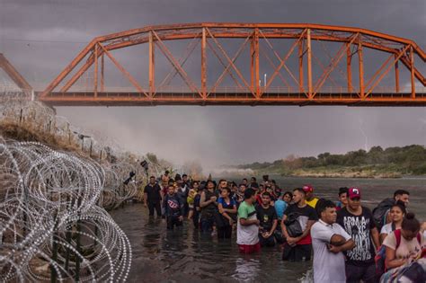 Overwhelmed Texas city declares state of emergency as more than 11,000 migrants (about half its ...