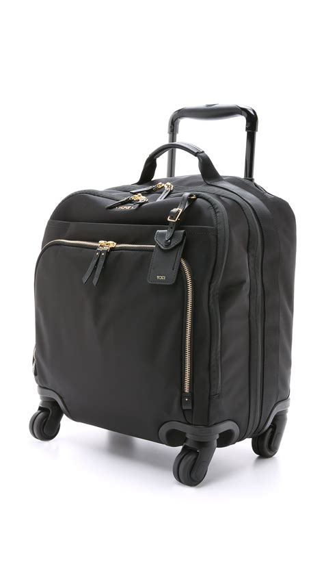 Tumi Oslo 4 Wheel Compact Carry On Luggage - Black in Black | Lyst