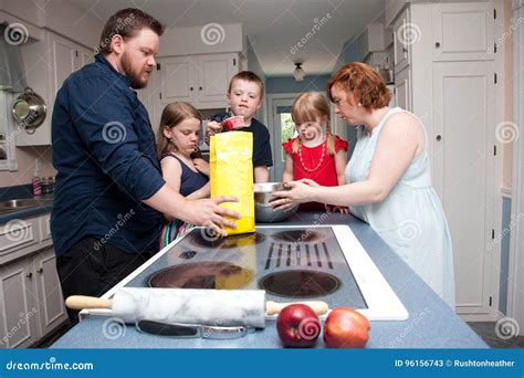 Family baking apple pie stock image. Image of creativity - 96156743