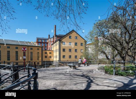 The old industrial landscape and Motala river on a sunny spring day. Norrkoping is a historic ...