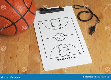 A Basketball With Coach's Clipboard And Whistle On A Wooden Gymn Stock ...