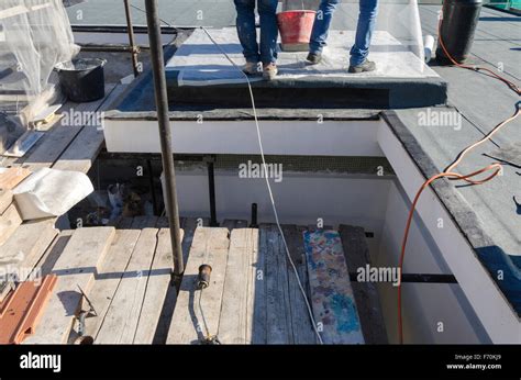 renovation of a roof with waterproof membrane Stock Photo - Alamy