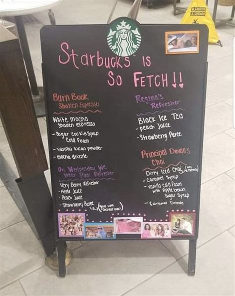 a starbucks menu board sitting on the floor