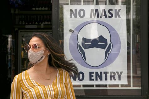 Wearing masks might help you avoid major illness even if you get ...