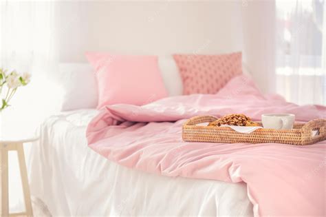 Premium Photo | Tray with tasty breakfast on bed