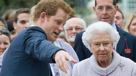 Prince Harry looks after his grandmother the Queen in unearthed photo ...