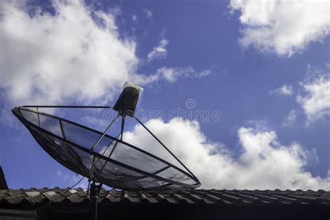 Satellite Dish on the Roof with Sunshine and Blue Sky Stock Image ...