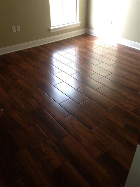 Pin by Acadian Flooring on Installation Gallery | Ceramic wood tile floor, Tile floor diy, Wood ...