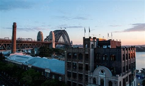 Image of Sydney Harbour Bridge at sunrise from The Rocks - Austockphoto