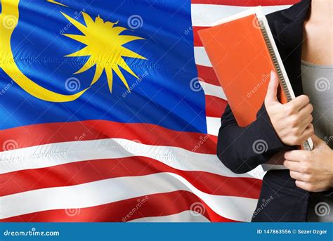 Learning Malaysian Language Concept. Young Woman Standing With The Malaysia Flag In The ...