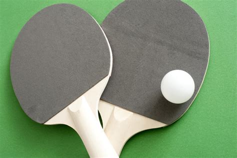 Free Stock Photo 11005 Close up Table Tennis Rackets with One White Ball | freeimageslive