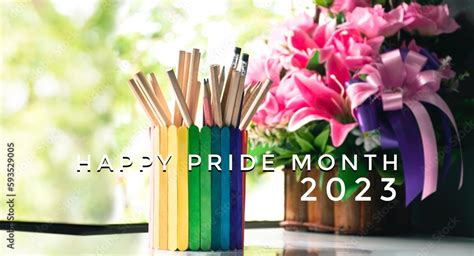 happy pride month 2023 on rainbow case which has various pencils inside ...