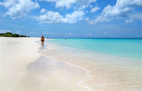 Arid, beautiful, breezy Oranjestad Beach on the bonbini island of Aruba. This happy island makes ...