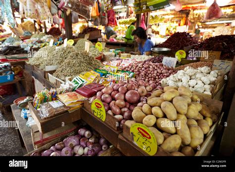 Chillies, fruit, vegetables, meat and fish for sale at the Chow Kit Market in Kuala Lumpur ...