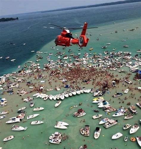 Lawsuit filed to stop massive Torch Lake sandbar parties - mlive.com