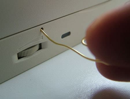 Help to eject a disc from optical drive with no eject button | Tom's Hardware Forum