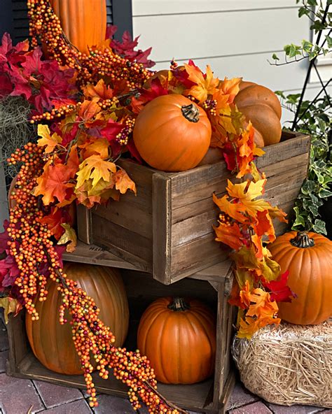 How to Decorate Your Door for Fall with a Pumpkin Arch - Celebrate ...