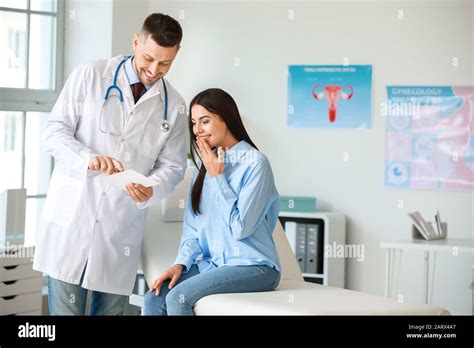 Male gynecologist working with woman in clinic Stock Photo - Alamy