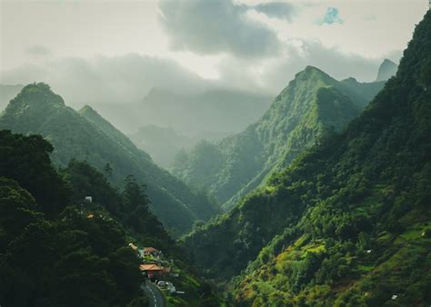 Free Photo | Mesmerizing scenery of green mountains with cloudy sky surface