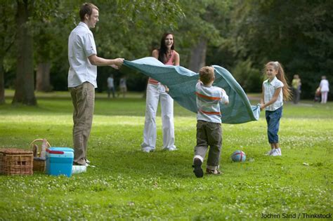 Family at one of the parks near Charlotte, NC | Davidson Village Inn