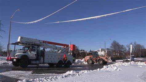 SPRINGHILL, NOVA SCOTIA, CANADA - FEBRUARY 9 2013 - Snow Plow Turning On To Rural Highway Taking ...