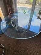 Glass and metal round table - Walker Auctions LLC