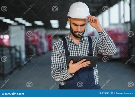 Warehouse Worker. Guy in Warehouse Worker Uniform. Stock Photo - Image of tablet, worker: 270623178