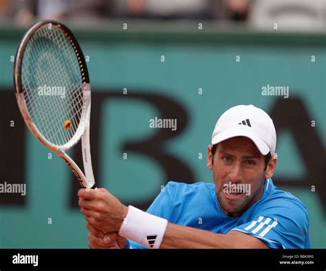 Novak djokovic backhand hi-res stock photography and images - Alamy