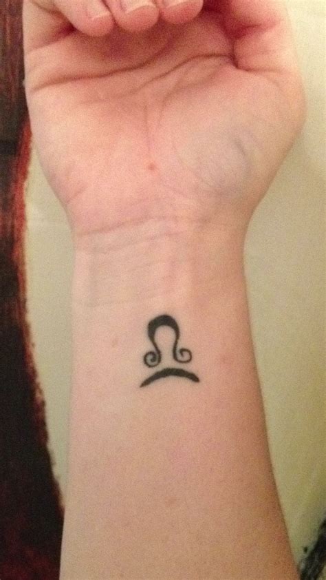 Libra tattoo I want it behind the ear | Wrist tattoos, Spine tattoos for women, Wrist tattoos ...