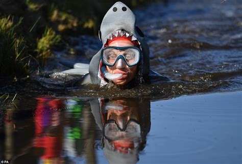 Hundreds of competitors don fancy dress to take part in the World Bog ...