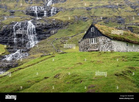 Waterfall and Buildings in Saksun Village, Streymoy Island, Faroe ...