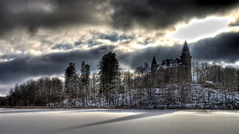 Castle on a hill above a frozen lake in winter r, forest, r, clouds, castle, HD wallpaper | Peakpx