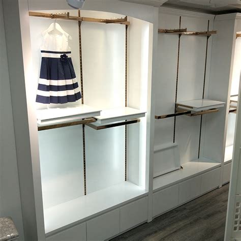 Wood clothing display shelves clothing showroom interior design ...