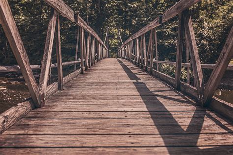 Alley Photography of Brown Wooden Bridge · Free Stock Photo